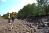 Crystal Payment and Phil Larson discuss the project at the Reservation River. All photos by Joe Friedrichs